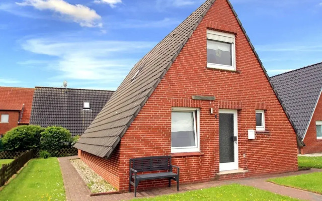 Ferienhaus Toms Hutte mit Terrasse in Dornum