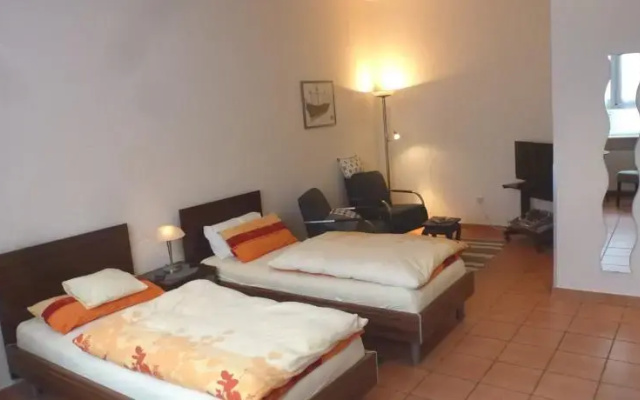 Häusser Apartment+Zimmer