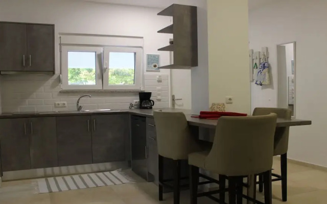 Anemomylos Lefkimmi Luxus Suites Hotel