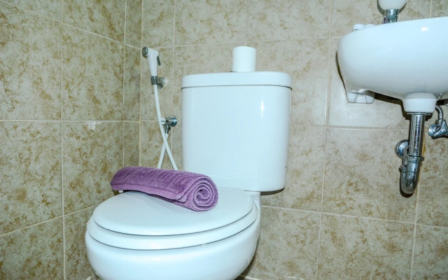 Modern Studio Grand Serpong Apartment By Travelio