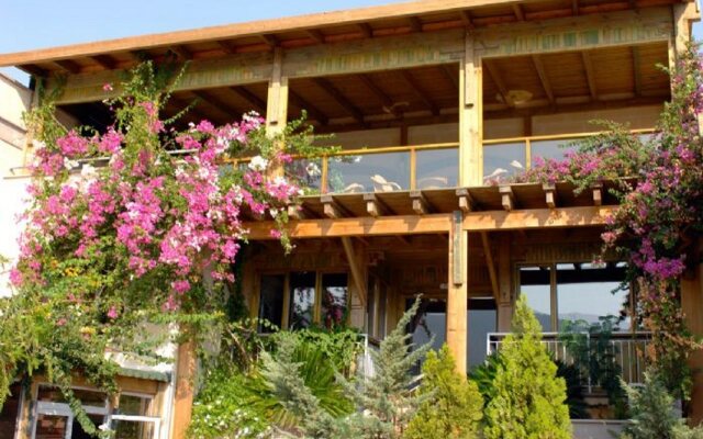 Happy Hotel Kalkan Турция, Калкан - отзывы, цены и фото номеров - забронировать отель Happy Hotel Kalkan онлайн вид на фасад