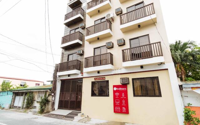 Отель RedDoorz near NAIA Terminal 1 Филиппины, Пасай - отзывы, цены и фото номеров - забронировать отель RedDoorz near NAIA Terminal 1 онлайн вид на фасад
