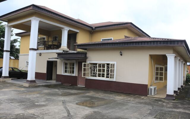 Отель Liz Ani Hotel Annex Нигерия, Калабар - отзывы, цены и фото номеров - забронировать отель Liz Ani Hotel Annex онлайн вид на фасад