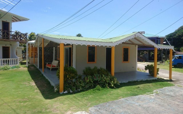 Kings Landing Hotel in Clifton, St. Vincent and the Grenadines from 183$, photos, reviews - zenhotels.com hotel front