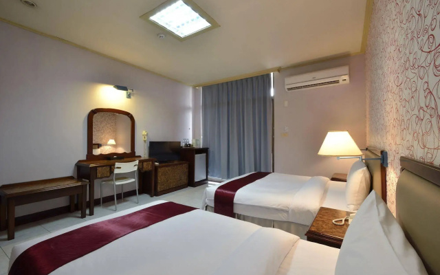 Jiuning Business Hotel
