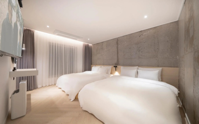 Croissant Hotel Guri by Anook