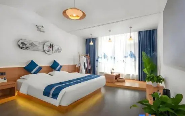 Yujia Homestay (Yuhuangding Suochengli Wanda Plaza Branch)