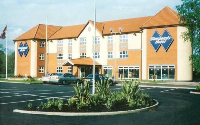 Diamond Lodge Hotel Manchester Манчестер вид на фасад