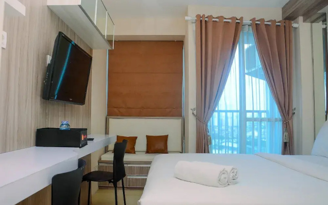 Cozy With Good Location Studio At Tifolia Apartment By Travelio
