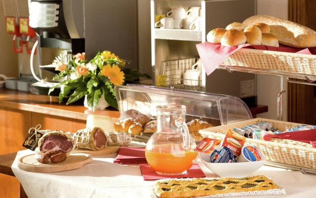 An agritourism complex with views of Assisi.