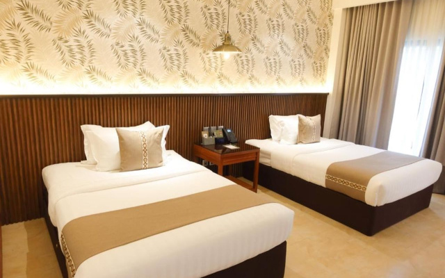 The Tropics at MacArthur Park Resort and Convention Center