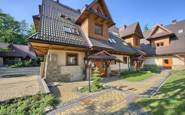 Апартаменты VisitZakopane White River Apartments вид на фасад