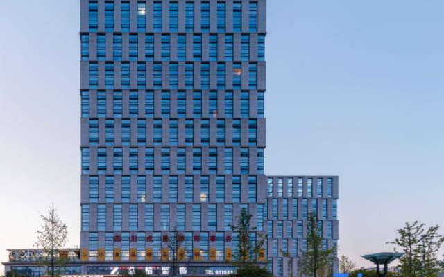 Orange Hotel (Yibin West Railway Station WanXiang World)