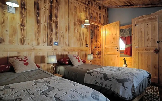 Aparthotel Foyer d'antan SUITE con caminetto hammam o vasca idromassaggio