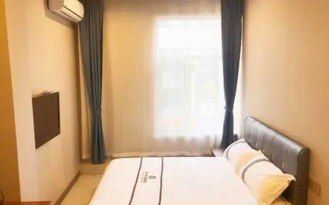 Huairen Mantianxing Apartment Hotel