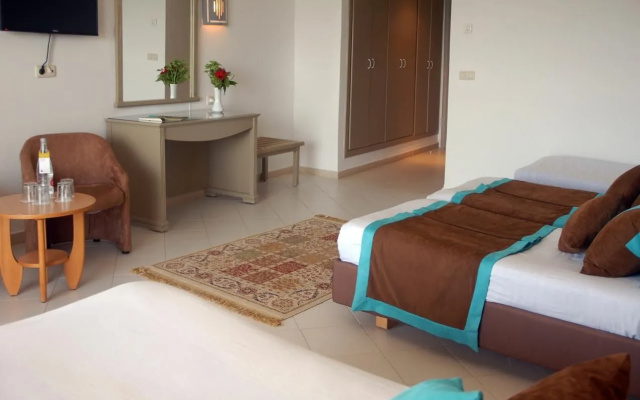Курортный отель Riadh Palms Resort & Spa