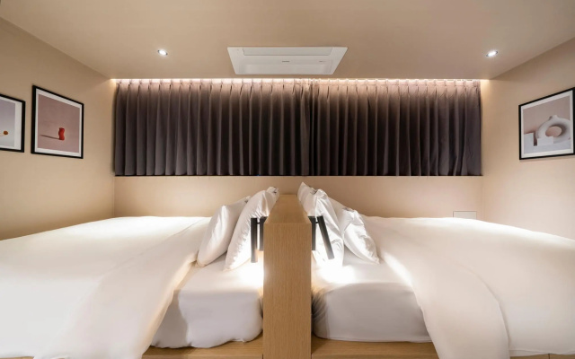 Croissant Hotel Guri by Anook