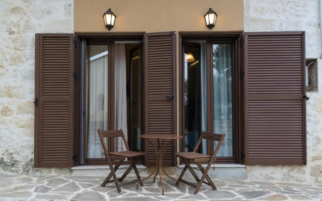 2 bedrooms appartement with enclosed garden and wifi at Ρούστικα