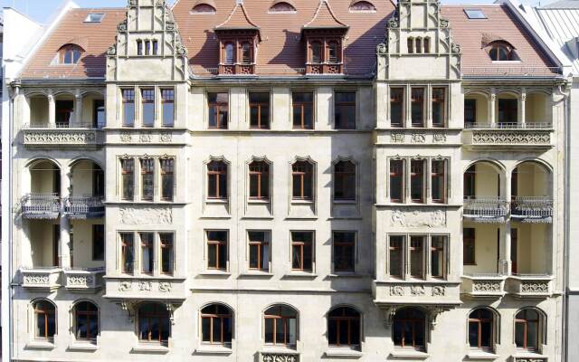 Отель Apartmenthotel Quartier M вид на фасад