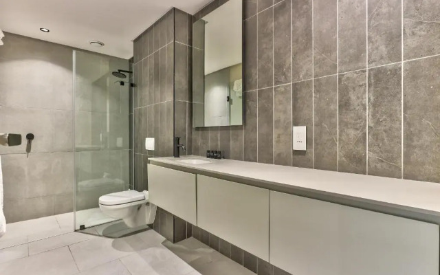 One Bedroom With Balcony and City Views