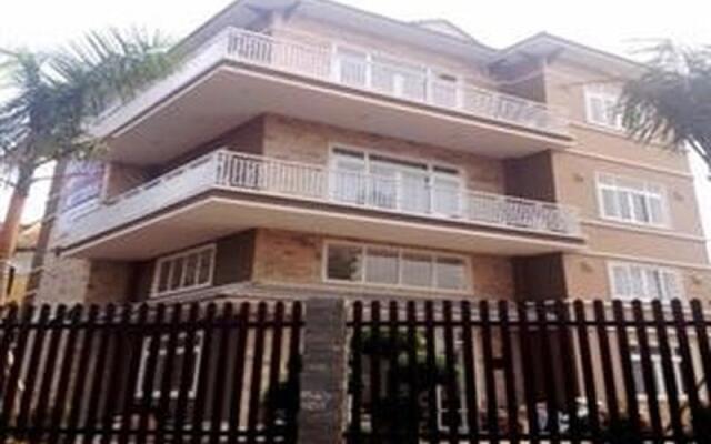 Апартаменты River Park Serviced Apartment вид на фасад