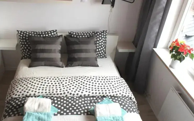 Yellow Peaked Shoe Apartment