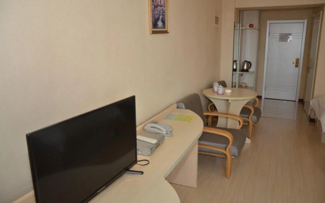Super 9 Business Hotel