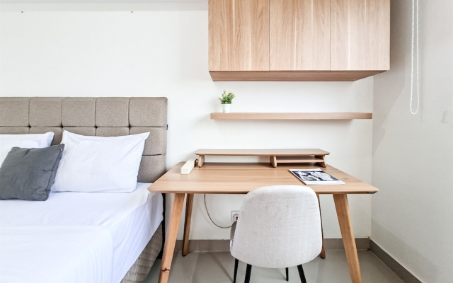 Compact White Studio At Cisauk Point Apartment