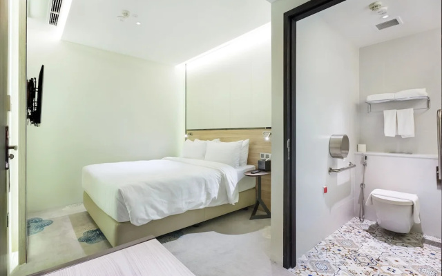 Woke Home Capsule Hotel