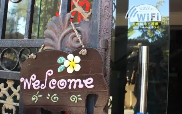 Mengla Bajiaolou Inn