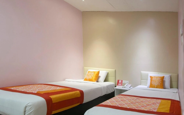 OYO 143 Swan Cottage Hotel