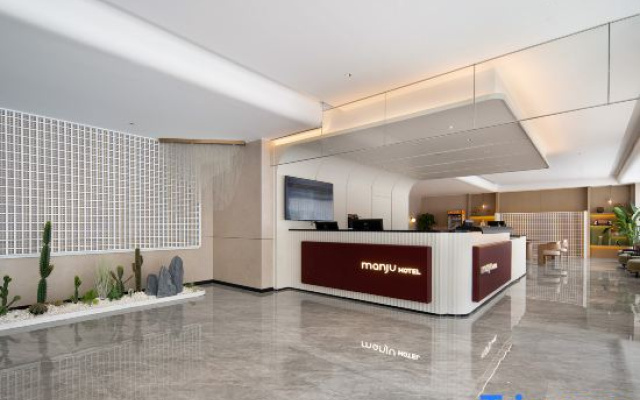 Manju Hotel Henglong Plaza Xi'an Road Subway Station Dalian