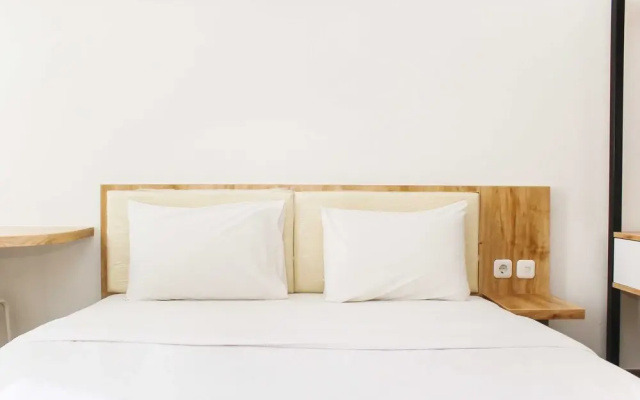 Homey and Cozy Studio at Riverview Jababeka Apartment