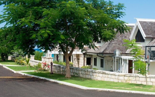 Отель Tallawah Villa, Silver Sands Jamaica 7BR вид на фасад