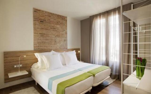 Отель Milà Apartamentos Barcelona комната для гостей