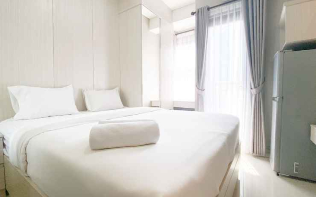 Cozy Living and Simple Studio Transpark Cibubur Apartment By Travelio