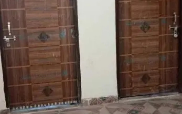 POP Royal Guest House Near GNIDA Office Metro Station