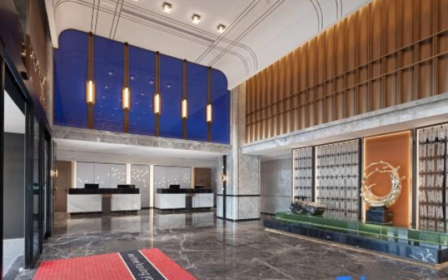 Xinyang Hampton by Hilton Hotel