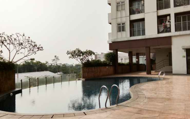 Bright and Clean Studio Apartment Serpong Greenview By Travelio