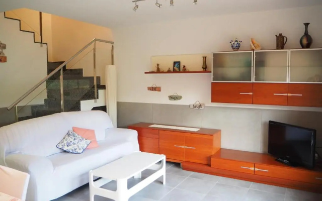 Casa l'Escala, piscina comuntària i jardí privat