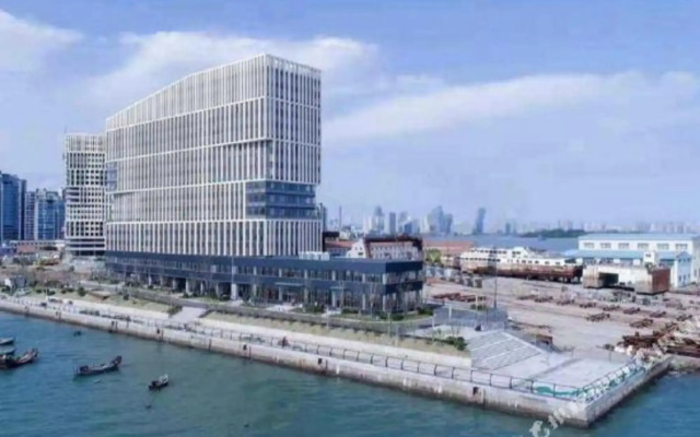 Qingdao Sihai Jiuzhou Hotel (Wuyue Plaza pengpaidao store)