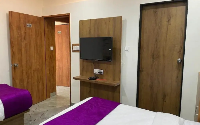 Collection O 87410 Hotel Karnavati