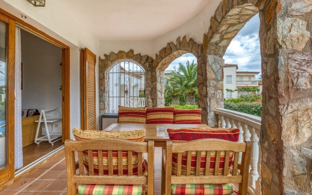 Cosy Townhouse in Vilamacolum With Shared Garden and Swimming Pool