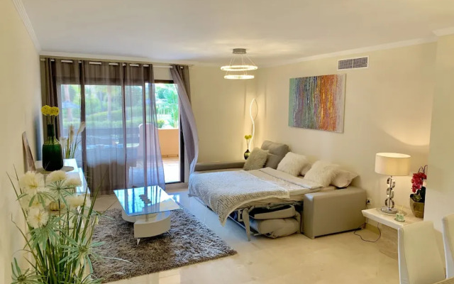 Casares Beach Golf Apartment With Private Garden and Pool Access