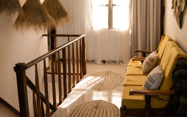 Kima Serviced Beach House & Suites