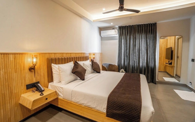 Aura Inn & Suites