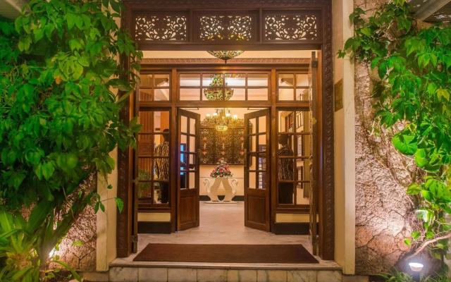 Отель Protea by Marriott Dar es Salaam Courtyard