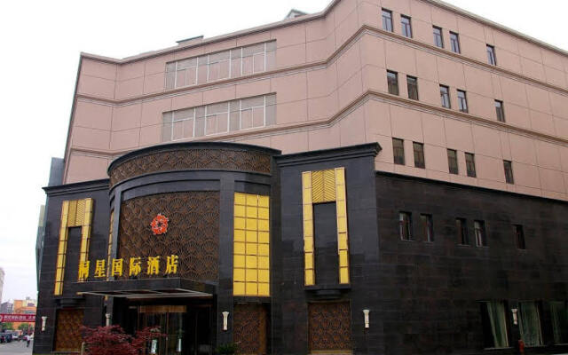 Tongxing International Hotel вид на фасад