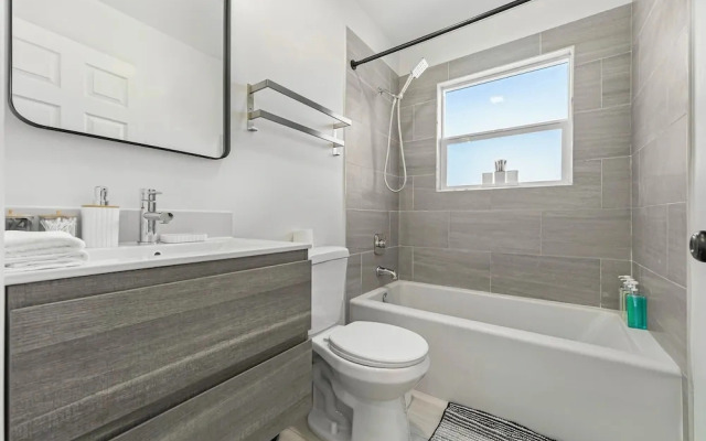 Spacious 8BR Home with AC & Parking