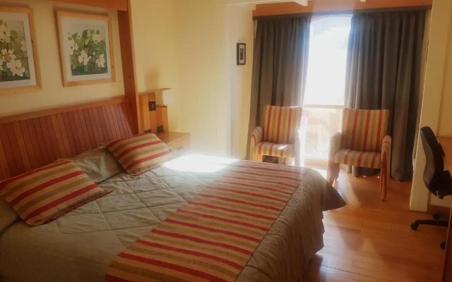 Le Village Hotel y Cabañas